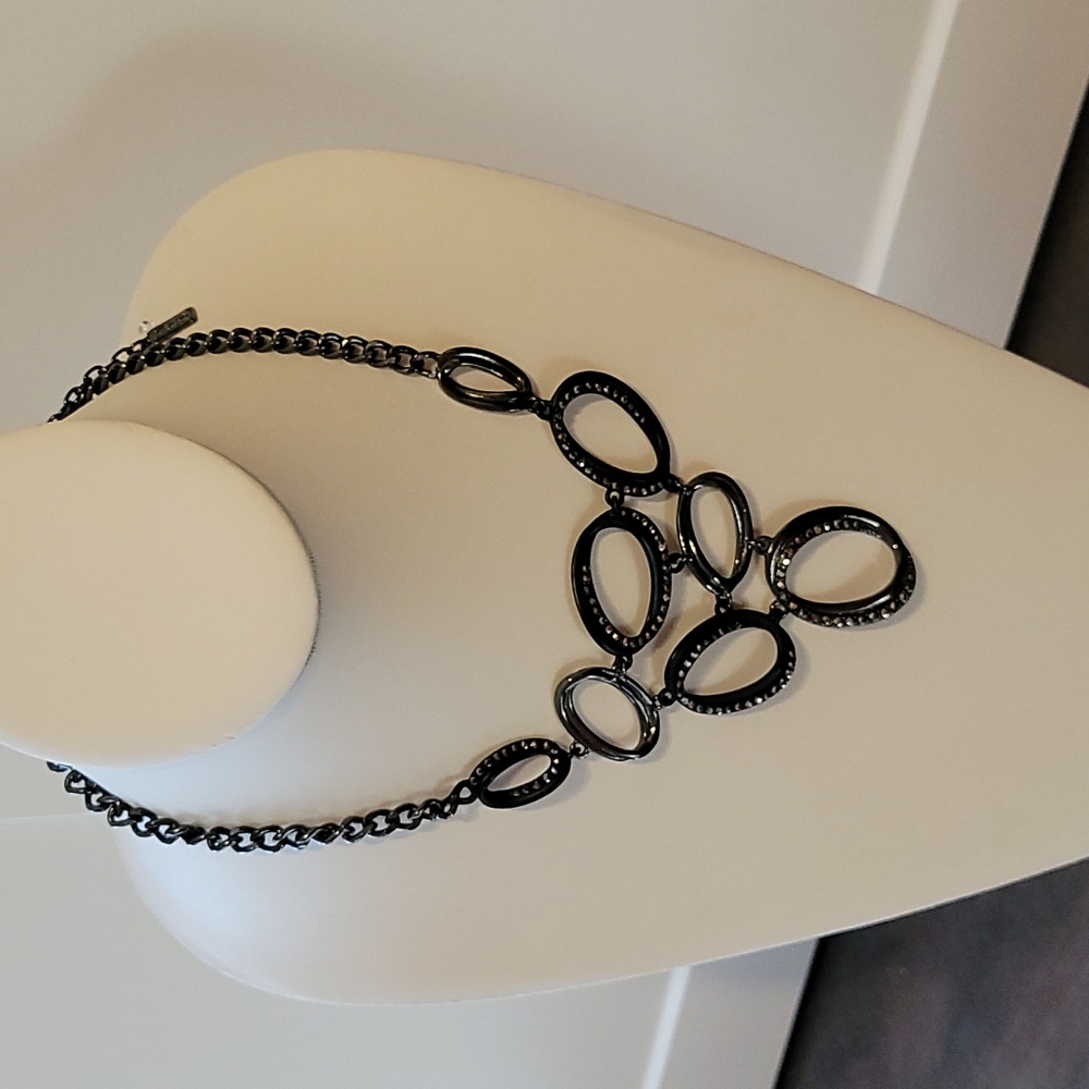 2/40 jewellry. Interesting necklace to dress up a bare neckline